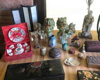 Asian items including lacquer boxes, ceramic foo dogs, carved stone lamp 