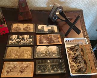 Antique stereoscope & stereoviews including images from World War 1, old metronome