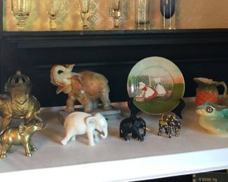 Elephants: cast metal incense burner, carved stone, brass & wood elephants, Royal Bayreuth frog creamer, R.B. Sunbonnet baby plate