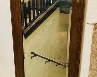 Old oak mirror with metal embellishments (25.5” x 48”)