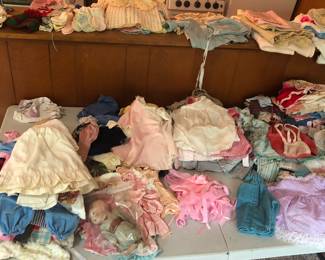 SO MANY doll clothes 