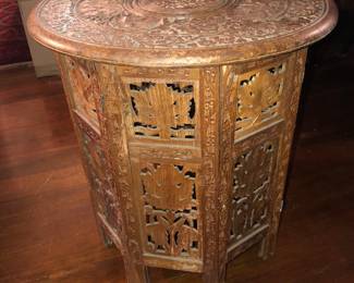 Anglo Indian carved wooden table - round top, octagonal base (18” diameter, 19” high)