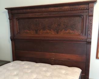 Antique Eastlake double/full bed with burlwood veneer (62”W, 78”L, 70” high at top of headboard, 34.5” high at footboard)