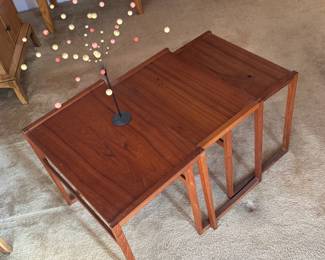 Danish modern nesting tables.  Largest table missing one side piece.
