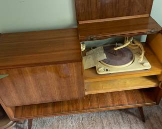 A look at the turntable on the mid century cabinet $300