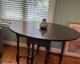 Oval drop-leaf table $150
