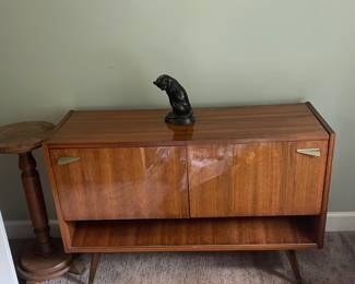Mid century modern radio and turntable cabinet. $300. Radio and record not working. 43" long x29" high x 14" deep.