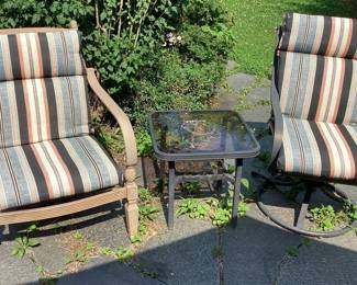 Set of 2 patio chairs with stripe cushions and wrought iron table
