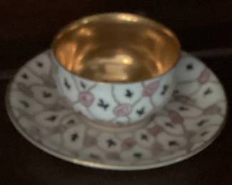 Cup and saucer with pink flowers gold trim