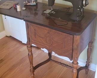 Graybar sewing machine and cabinet, manual included Rotary electric sewing machine