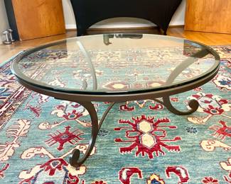 Glass and iron coffee table
