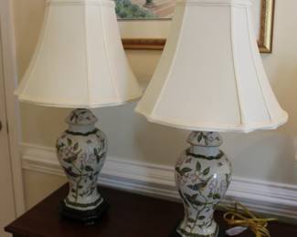 Porcelain ginger jar style lamps with bird motif and pristine shades, 25.5" h x 6" base