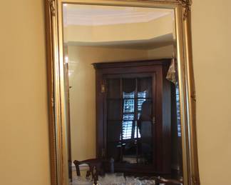 gold framed mirror; 42" h x 29.5" w