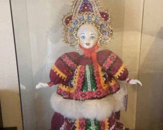 Doll In Glass Case