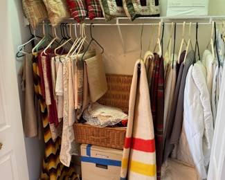 Assorted blankets, throw pillows and linens