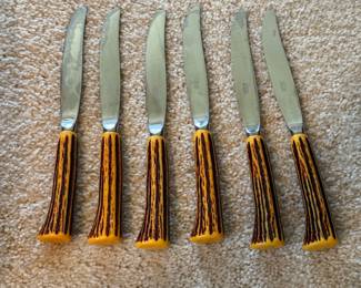 Vintage faux stag horn bakelite steak knives