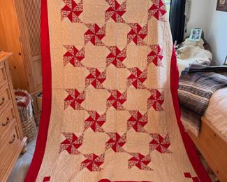 Red and white patchwork quilt