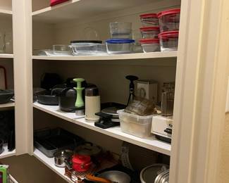 Lots of storage, baking pans, crock pot, roasting pans