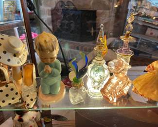 Perfume bottles, vintage little boy in prayer