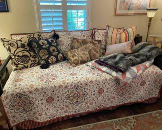 In the office you will find this day bed with trundle and it includes custom bed linens. Cushions and great throws