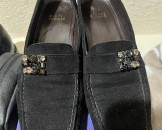 Ladies Stuart Weitzman shoes. Check the price tag out in the next photo.