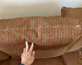 Brown with multicolor sofa available for pre-sell. Very clean very comfortable is upstairs.