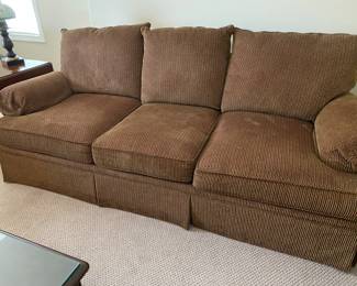 Brown with multicolor sofa available for pre-sell. Very clean very comfortable is upstairs.