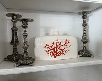 Various candlesticks and decorative vases for sale