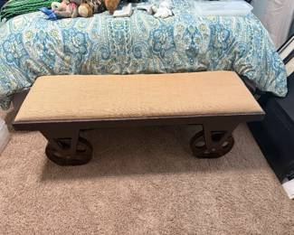 End of bed bench for sale. Burlap and metal. Working wheels