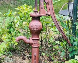 Dempster Mill Hand Water Pump & Engraved Sundial on Wooden Post