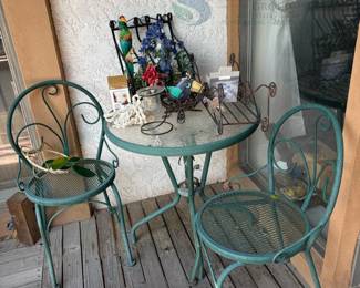 Green Metal Outdoor Patio Table and Chairs Set with Decorative Items