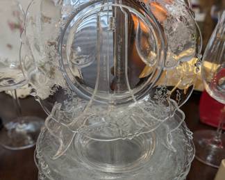 8 Antique Etched Glass Luncheon Plates
Delicate floral design with scalloped rims and subtle beading. These early 20th-century plates contain manganese, giving them a soft lavender glow under UV light—a hallmark of true antique glass.