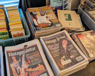 Stacks of Vintage Guitar Magazines