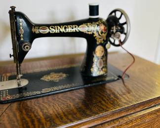 Antique Singer treadle sewing machine with desk