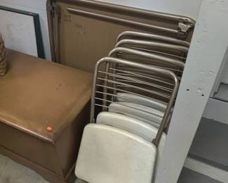 vintage folding table and padded chairs