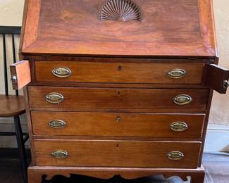 Early 19th century slant front walnut desk. Dovetailed corners, shell carved doors/drawers. (closed)