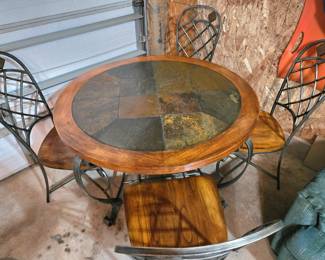 Nice stone top table w/4 chairs
(available for pre sale)