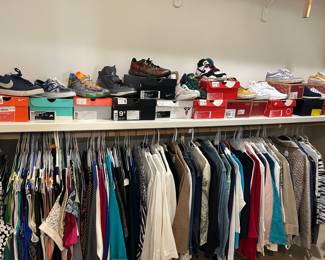 A closet full of Chico's women's clothing and desirable men's sneakers!