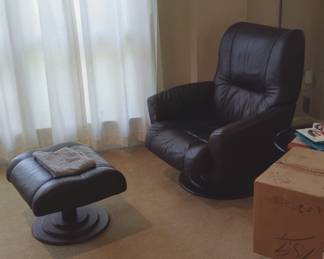 Leather chair with footstool