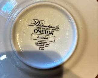 Oneida Amelia Service for 8 - 1998-1999 Made in USA 10.5" diameter (one dinner plate cracked)                                          Dinner plates, bowls, dessert plates, sugar creamer, cups and saucers