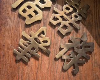 Brass accents and Chinoiserie style throughout home
