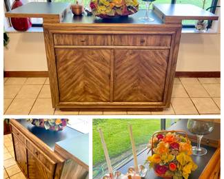 Vintage Stanley rolling server or side bar in Fruitwood
Black Laminate pebble finish foldout top
2 drawers with lower cabinet, shelves