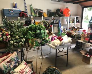 Garage items:  seasonal decor, garden tools, camping equipment including sleeping bag, Coleman lamps and utensils case, tarps, umbrellas, yard 
chairs, Igloos.   Silk flower arrangements.  Extra furniture.  Ladders.  Small tools, supplies.
