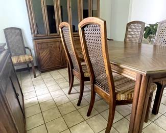 Vintage Stanley Dining table in Fruitwood
- 2 leaves
4 Caned Back Arm chairs
2 Caned Back Arm Chairs