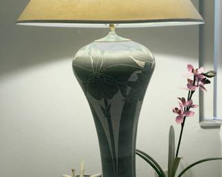 Signed carved pottery lamp.  Incised orchid.  There is a pair of these exquisite lamps.  