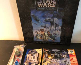 Star Wars.  The Empire Strikes Back 
puzzle.  Star Wars Shadows of the Empire only fits Nintendo.  Star Wars toothpaste/brush set.  R2-D2 flyer.  
