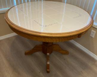 Round dining table by Ashley 
