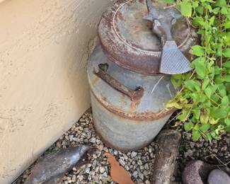 Cream can, boot puller, metal yard art