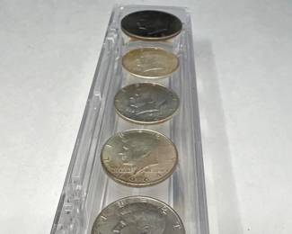 Four 1964 Kennedy Half Dollars & Ike 1972 Dollar Coin