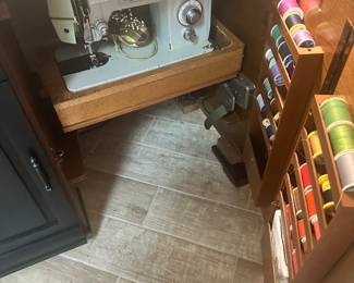 #116 - $280 - Black sewing cabinet with sewing machine